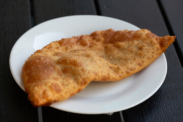 fried pies with meat - chebureks oriental cuisine