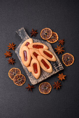 Delicious sweet crispy cookies with jam filling in the center