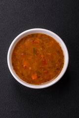 Delicious hot tomato soup with vegetables, vegan, vegetarian food
