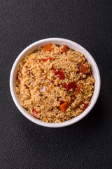 Delicious hot boiled wheat porridge couscous with vegetables