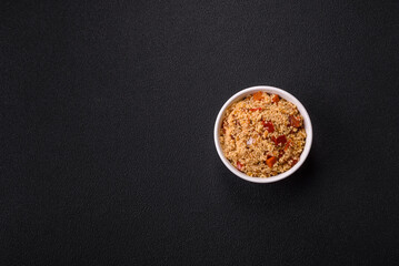 Delicious hot boiled wheat porridge couscous with vegetables