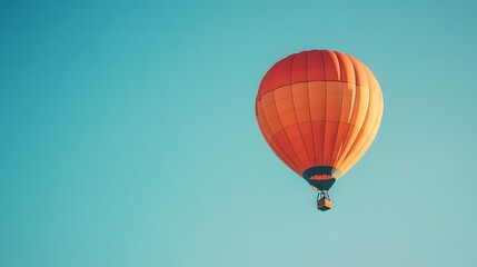 Fototapeta premium Hot Air Balloon Soaring Through the Sky