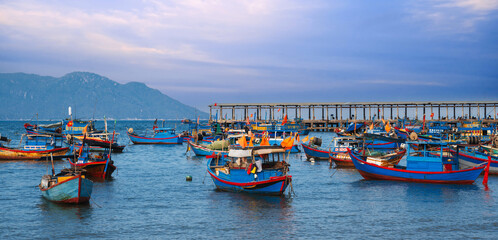 Vietnamese traditional fishing boats at the seaport