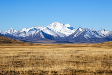 A distant view of snow-capped mountains under a clear blue sky 