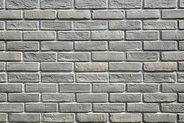 Fototapeta premium Close up image of a detailed grey brick wall pattern perfect as a background or texture for creative projects, building, architectural, closeup, rough, grey, retro, solid, grunge, detail