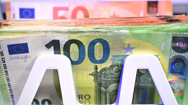 Close up of 100 Euro Banknotes on Display in a Currency Exchange Office