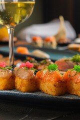 Sushi on Black Stone Table