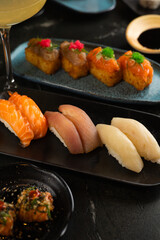 Sushi on Black Stone Table