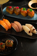 Sushi on Black Stone Table