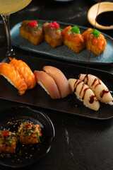 Sushi on Black Stone Table