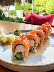 Classic Philadelphia sushi roll set with salmon and cream cheese.