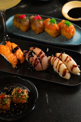 Sushi on Black Stone Table