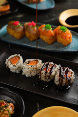 Sushi on Black Stone Table