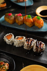 Sushi on Black Stone Table