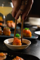 Sushi on Black Stone Table
