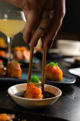 Sushi on Black Stone Table