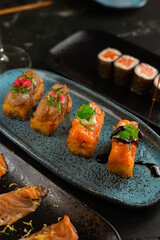 Sushi on Black Stone Table
