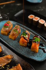 Sushi on Black Stone Table