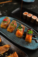 Sushi on Black Stone Table