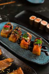 Sushi on Black Stone Table