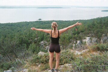 women doing yoga on mountain 