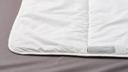 Obraz premium Closeup of duvets and bed sheets.