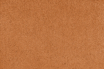 Plain orange colored microfiber detail texture, suede leather structure, textile background