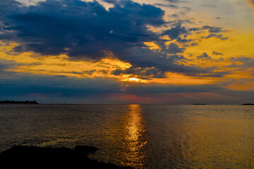 Sunset Reflections on the Plata River