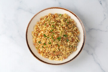 Traditional delicious Turkish food, bulgur pilaf with vermicelli (Turkish name; arpa sehriyeli bulgur pilavi)