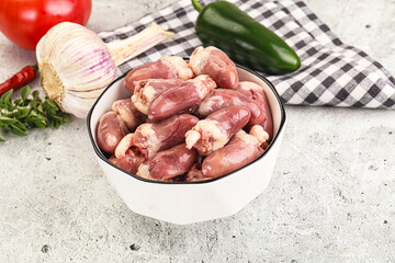 Fresh raw chicken hearts in the bowl