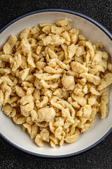 pasta spaetzle egg pasta irregular shape fresh meal food snack on the table copy space food background rustic top view