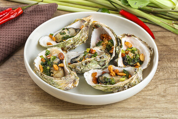 Baked oysters with green onion