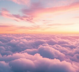 sky above clouds at dusk, with a pink and orange sky