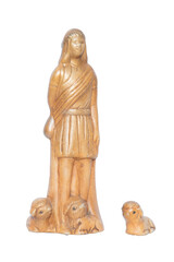 Golden figure of a shepherd with three sheep. Christmas decorative figurine isolated from a nativity scene.