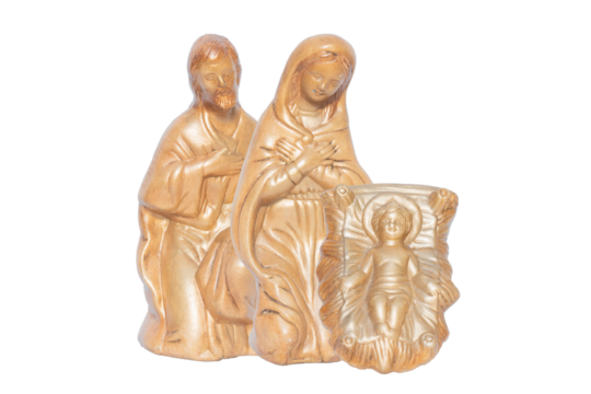 Golden statuettes of Jesus, Virgin Mary and Joseph. Porcelain figurines of nativity scene. An isolated manger. Concept of Christmas and Birth of Jesus.