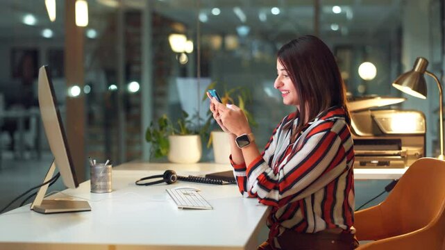 Phone, typing or happy business woman laugh at text message, email chat or meme online at startup. Mobile, funny or creative worker on app for joke, break or comedy script writer on deadline at night