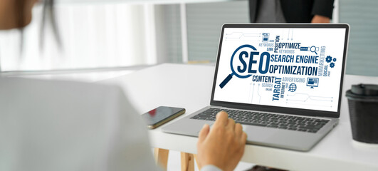 SEO search engine optimization for modish e-commerce and online retail business showing on computer...