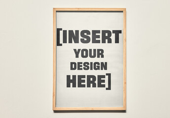 Mockup Of Poster Hanging On The Wall In Wooden Frame. 