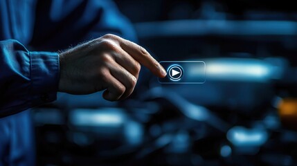 A hand interacts with a digital interface in a mechanics workshop, symbolizing technology and innovation in automotive repair.