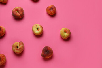 Sweet fig peaches on pink background