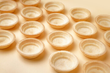 Homemade tartlets on yellow background