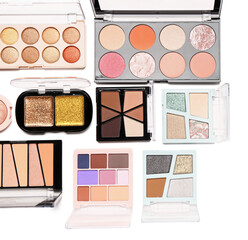 Different palettes of stylish eyeshadows on white background