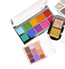 Different palettes of modern bright eyeshadows on white background