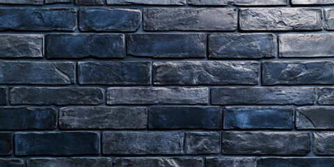 Fototapeta premium A textured, dark blue brick wall with subtle variations in color and a matte finish, creating a cool, modern aesthetic.