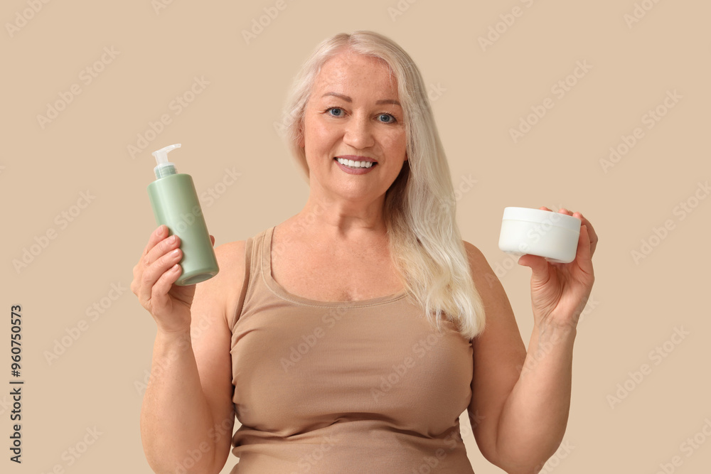 Poster mature blonde woman with hair care products on beige background