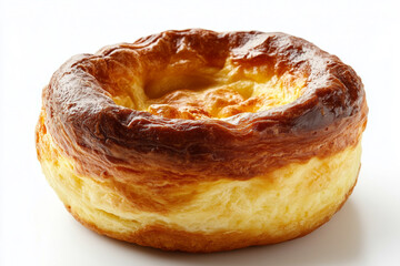 Deliciously golden Yorkshire pudding resting elegantly on a pure white background, showcasing its perfect texture and enticing aroma