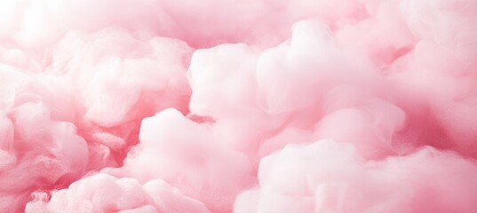 Pink pastel background with fluffy clouds.