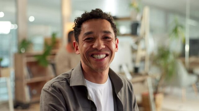 Design, face and laughing with employee man in creative workplace for small business startup. Funny, humor and portrait of happy designer in agency or artistic office for development and inspiration