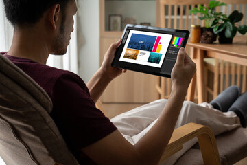 Graphic designer software for modern design of web page and commercial ads showing on the computer screen