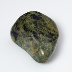 Polished Serpentine Gemstone on Pristine White Background - Natural Elegance